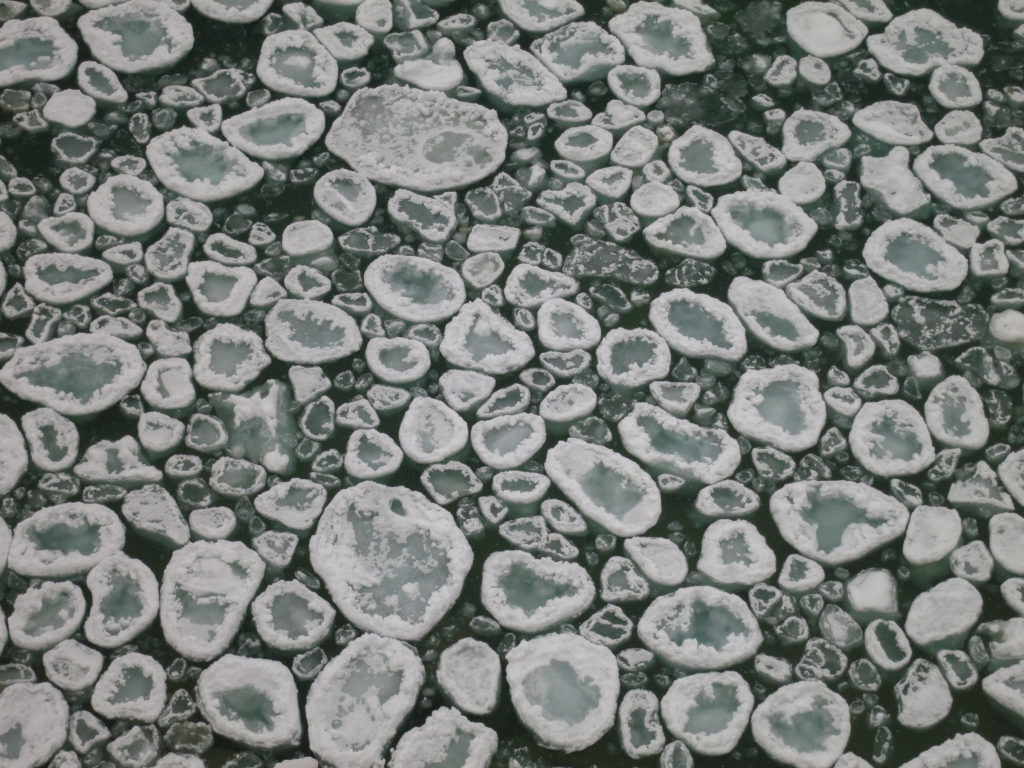 Pancake ice, pictured Rocks winter camping
